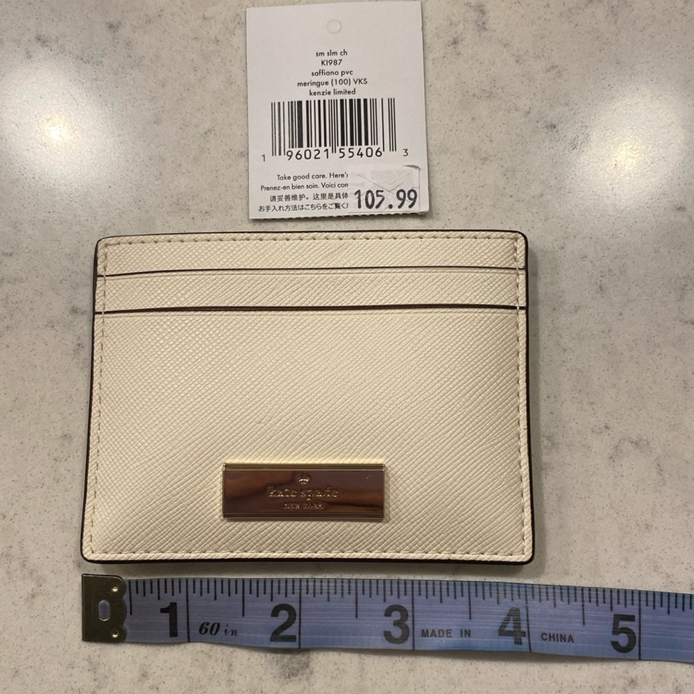 Kate Spade New York cream sm slim card holder w open centre pocket saffiano pvc
